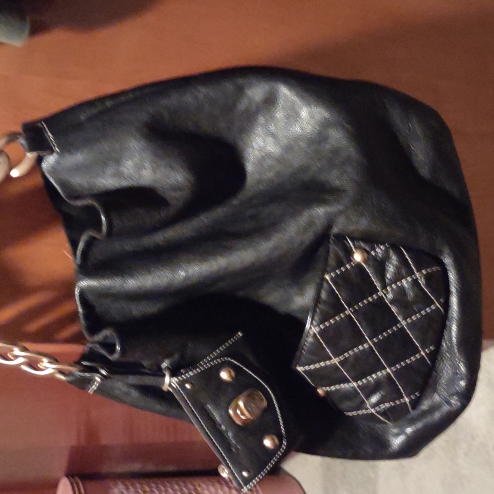 Juicy Couture large vintage pebbled leather shoulder bag with quilted pocket.